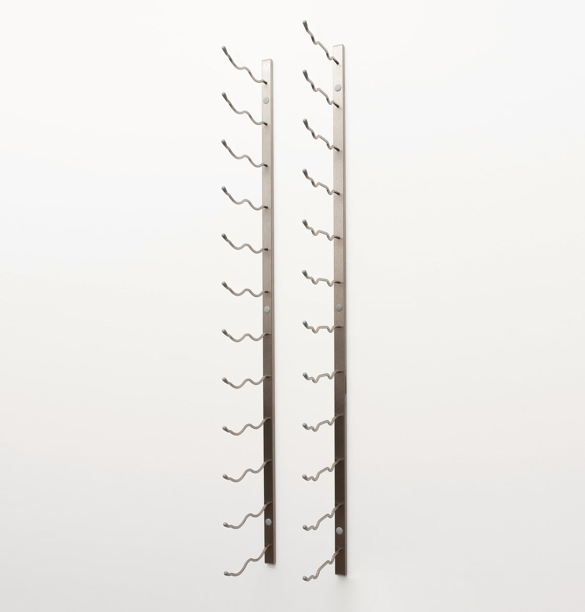 Wall-mounted wine rack with two bronze metal frames and curved bottle hooks