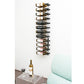 Wall-mounted wine rack with black bottle holders holding wine bottles