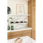 Installed wall wine bottle rack with three rows of bottles on white stone shelf
