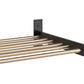 1-column wine wall rack with bronze-toned bars and black corner mounting bracket
