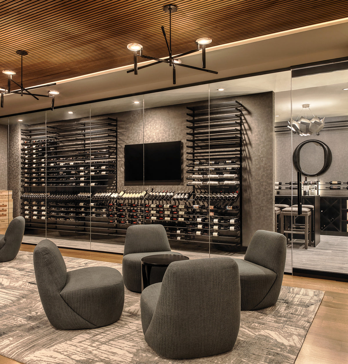 Wine bottle display wall with metal bottle racks in three-column layout