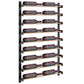 Black wine bottle wall rack with two columns and bottles resting on horizontal wooden bars