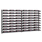 Black designer wine rack wall with grid spacing and bottle holders across full width