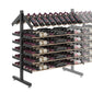 Double-sided bottle display rack, 3/4 view with black frame and multiple bottle rows
