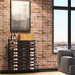 Double-sided island display rack with black metal frame and rows of wine bottles
