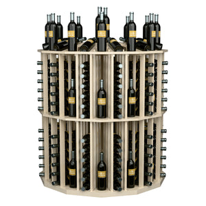 Round bottle display rack with dark wine bottles in light wood cubbies, angled view