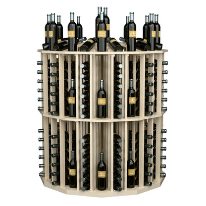 Round bottle display rack with dark wine bottles in light wood cubbies, angled view