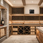 Wall-mounted through-wall cooling unit with front grille and control display on cellar wall