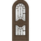 Brown wood wine cellar door with arched iron speakeasy grille and decorative inset panels
