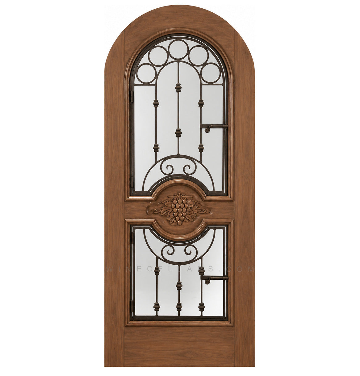 Warm brown wood wine cellar door with arched iron speakeasy grille and decorative inset panels