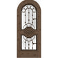 Stone-tan wood wine cellar door with arched iron speakeasy grille and decorative inset panels