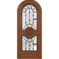 Warm brown arched wine cellar door with decorative iron grille and two glass panels