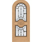 Light tan arched wine cellar door with decorative iron grille and two glass panels