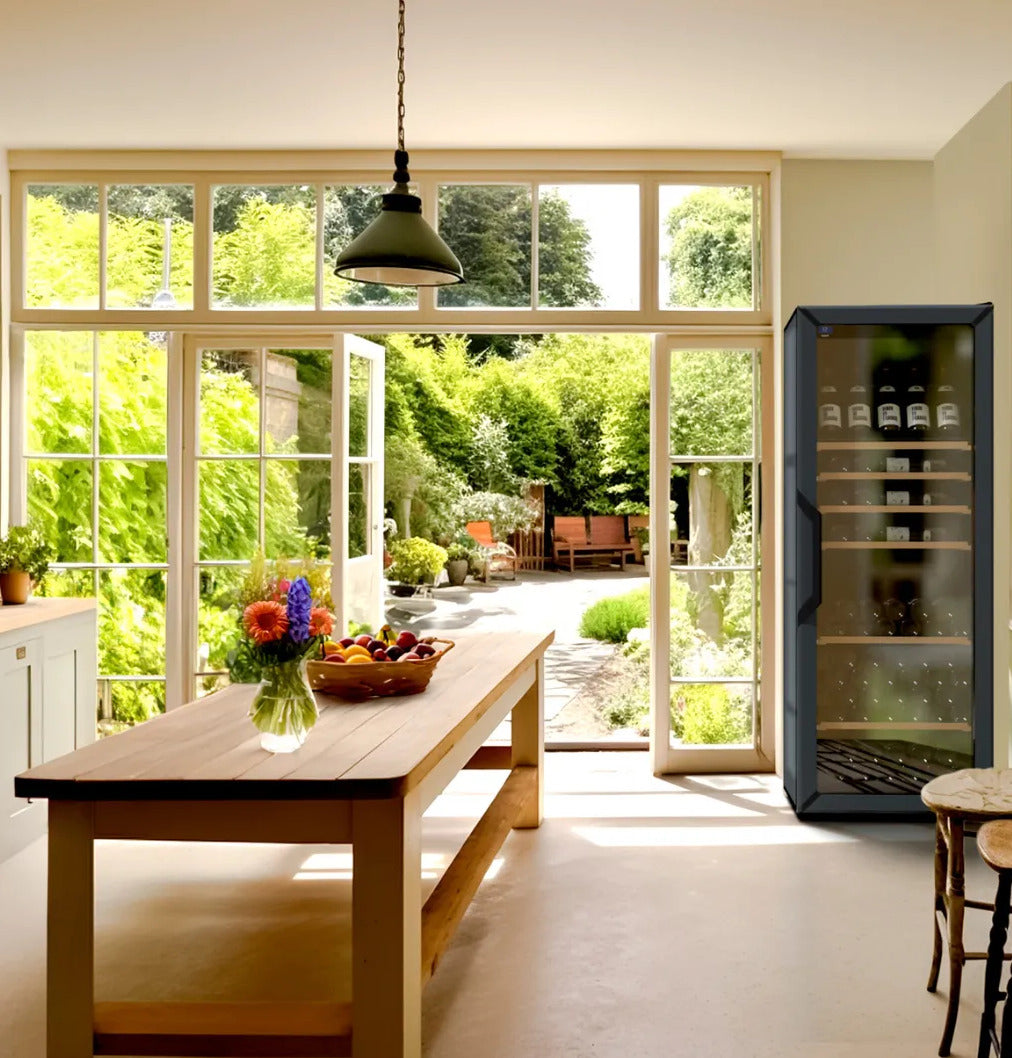 Goguette wine shelf insert visible in a wine cooler beside a kitchen table