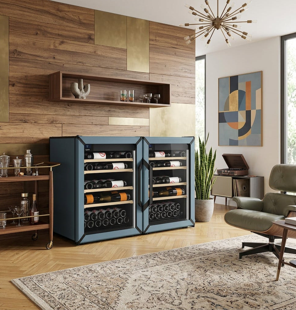 Pair of slate blue wine refrigerators with glass doors, shown in a living room