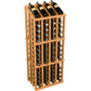 Wine bottle display rack with dark bottles in a warm wood frame and circular metal bottle holders.