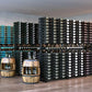 Double-sided wine bottle display rack with dark frame and rows of bottles