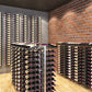 Wine rack extension with bottle slots on a metal frame, angled view