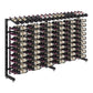 Wine bottle display rack with black frame and many bottles on angled wire slots