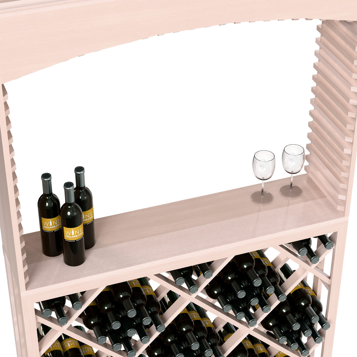 Whitewashed wine tasting shelf with bottles, two stem glasses, and diamond lattice rack.
