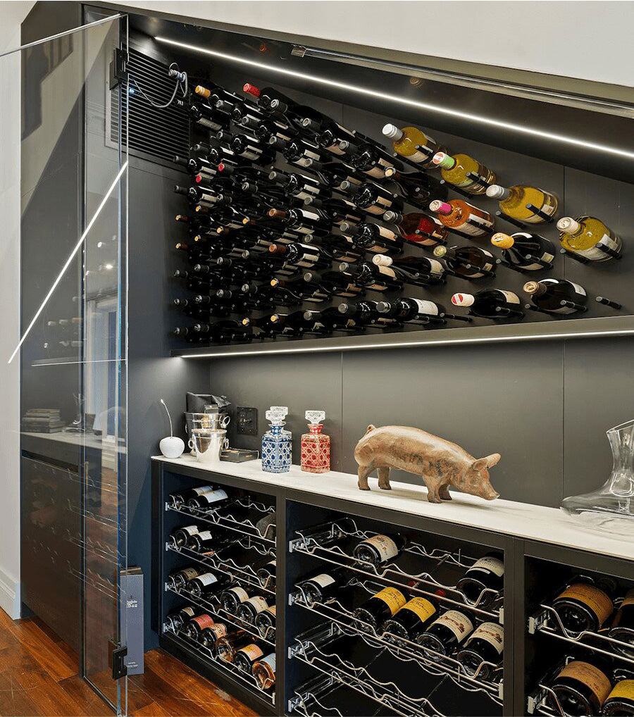 Wine storage cabinet with cork-out bottle pegs, multiple bottles in rows.