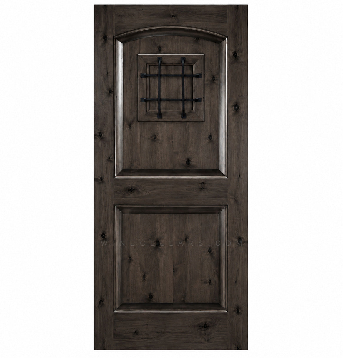 Dark stained wood wine cellar door with arched top, iron speakeasy grille, and recessed panels