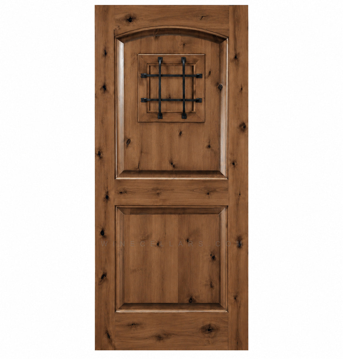 Medium brown wood wine cellar door with arched top, iron speakeasy grille, and recessed panels