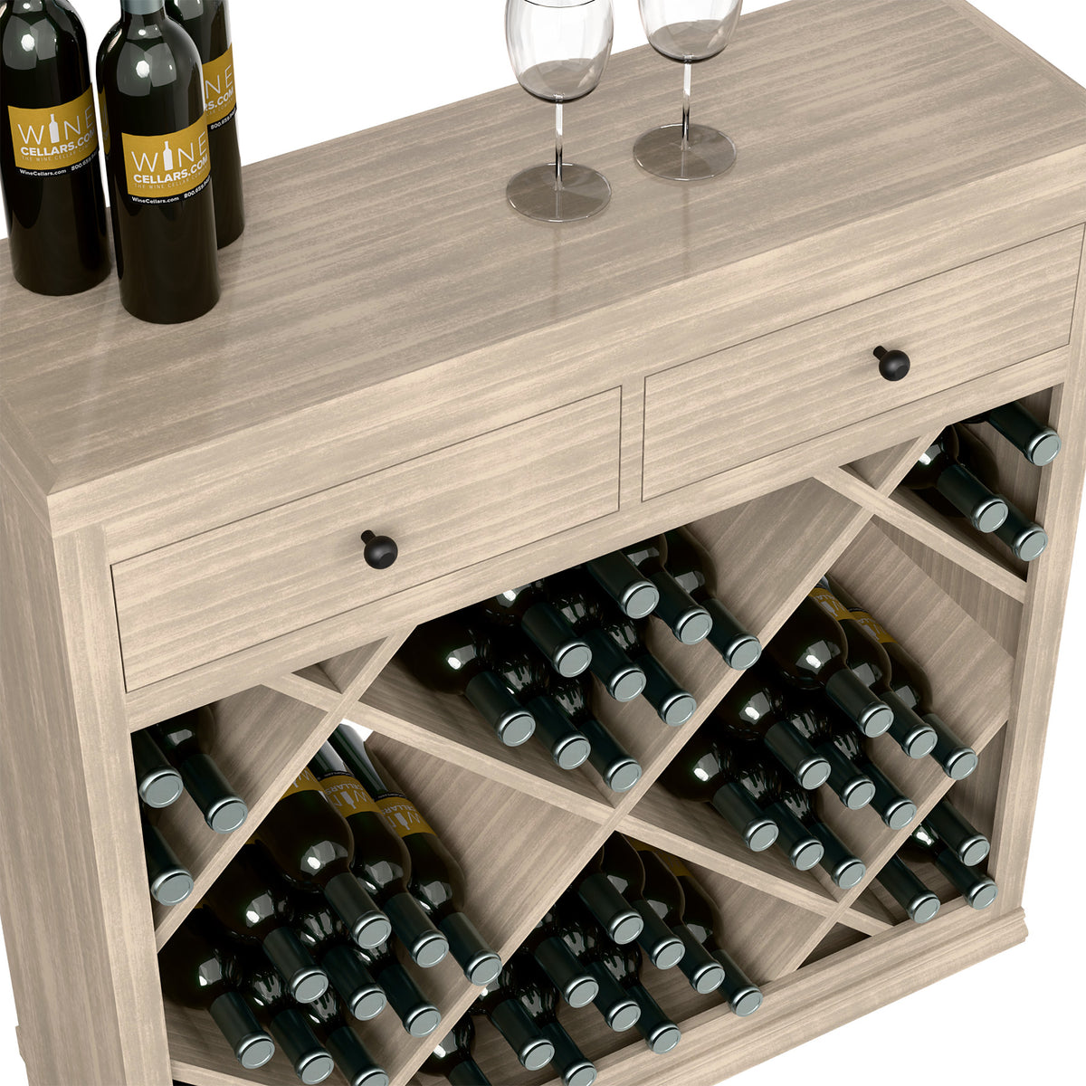 Close-up of light gray wine rack with diamond dividers and two drawer pulls on top.