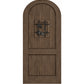 Arched-top wooden wine cellar door in dark brown with centered wrought-iron speakeasy grate