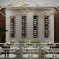 Gold wall-mounted wine rack with bottle slots filled with assorted bottles