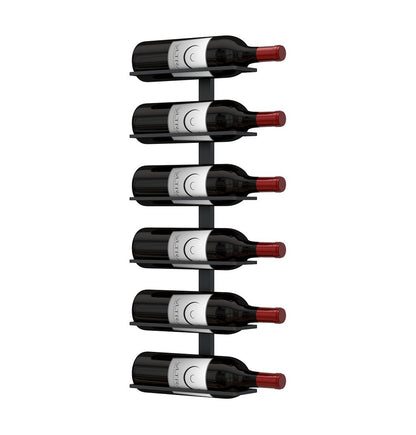 Wall wine rack with several wine bottles displayed vertically, red caps visible