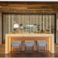 Mounted backer channels behind a counter, multiple vertical rails on wall