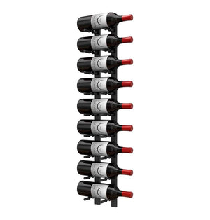 Wall-mounted wine bottle peg rack with multiple dark bottles and red corks