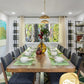 Wall wine peg rails with bottle display pegs in a dining room