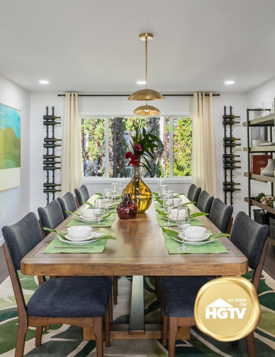 Wall wine peg rails with bottle display pegs in a dining room
