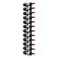 Wall-mounted wine bottle peg rack holding dark bottles with red corks