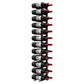 Wall-mounted wine bottle peg rack holding dark bottles with red corks