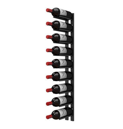 Black wall-mounted wine rack rail with multiple cork-out bottle pegs and dark bottles