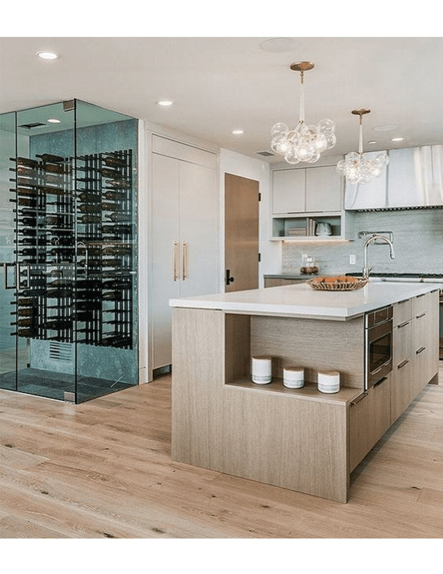 Wall wine rack display with black peg rails holding cork-out wine bottles