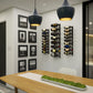 Wall-mounted metal wine rack with multiple rows of dark wine bottles on wall mounts