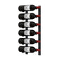Wall-mounted metal wine rack holding six wine bottles with red supports