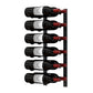 Wall-mounted metal wine rack holding five wine bottles with red bottle supports