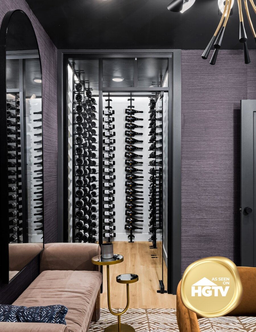 Wine storage wall with single-sided black peg rack for label-out bottle display