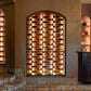 Arched wall wine bottle rack with black pegs, filled with bottles