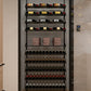 Indoor liquor display shelf with wine bottle racks and spirit bottles on center ledges