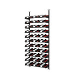 Freestanding black wine rack with long horizontal tiers and bottles arranged in rows