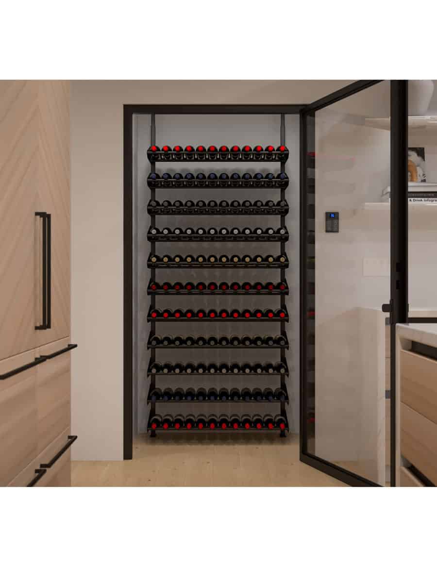 Black wine bottle display rack inside a cabinet door with multiple bottle rows
