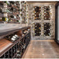 Wine bottle peg wall display with many bottle holders and pegs