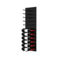 Black acrylic wine bottle wall rack with several peg rows and stacked bottles at base.