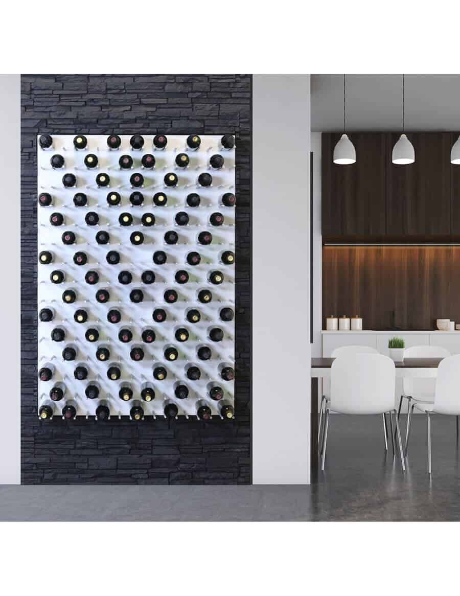 Wine bottle wall rack with white pegs, filled with mixed dark and light bottles